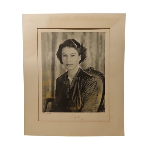 2555 - QUEEN ELIZABETH II AND PRINCE PHILIP, DUKE OF EDINBURGHA pair of portrait photographs by Baron (Ster... 