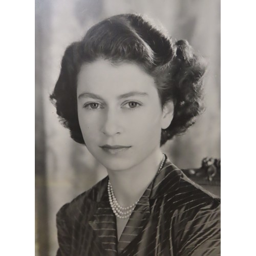 2555 - QUEEN ELIZABETH II AND PRINCE PHILIP, DUKE OF EDINBURGHA pair of portrait photographs by Baron (Ster... 