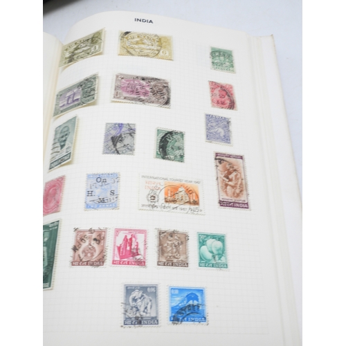 7108 - A lot comprising various stock books containing a world wide stamp collection to include GB 1/d red ... 