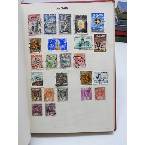 7108 - A lot comprising various stock books containing a world wide stamp collection to include GB 1/d red ... 