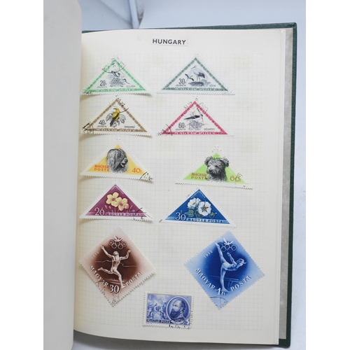 7108 - A lot comprising various stock books containing a world wide stamp collection to include GB 1/d red ... 
