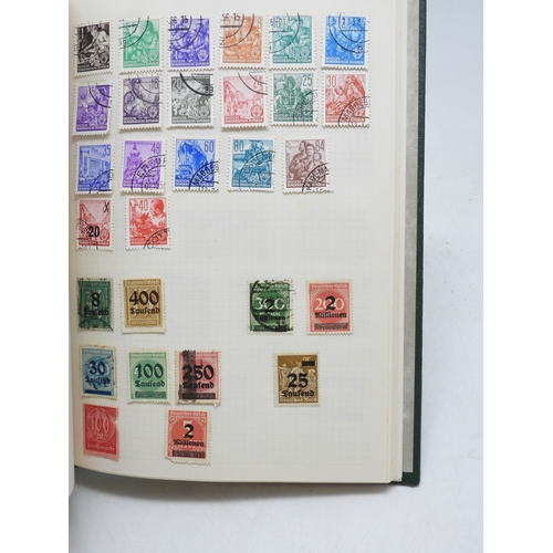 7108 - A lot comprising various stock books containing a world wide stamp collection to include GB 1/d red ... 