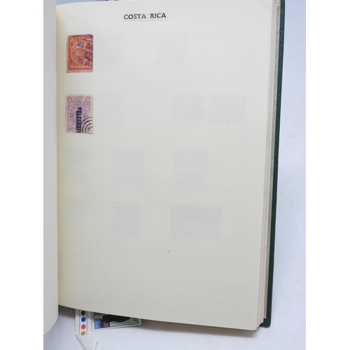7108 - A lot comprising various stock books containing a world wide stamp collection to include GB 1/d red ... 