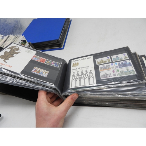 7111 - A lot comprising first day covers many with associated British Post Office Mint Stamps, Robert Burns... 