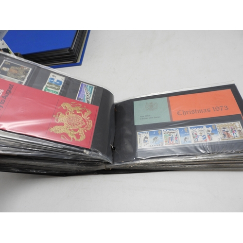 7111 - A lot comprising first day covers many with associated British Post Office Mint Stamps, Robert Burns... 