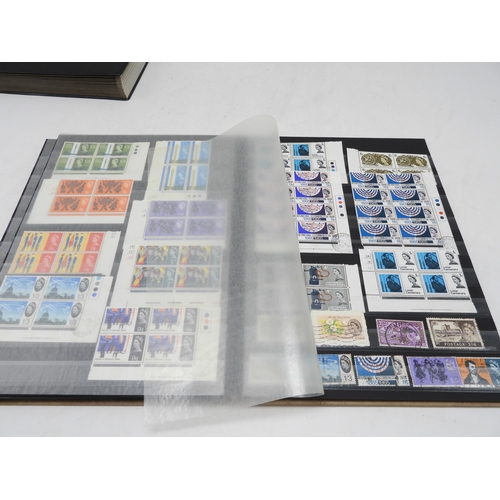 7113 - Great Britain a lot of mostly Elizabeth II unmounted mint stamps in blocks and strips contained in i... 