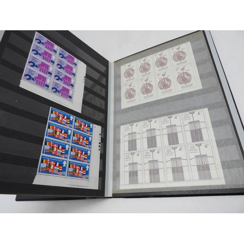 7113 - Great Britain a lot of mostly Elizabeth II unmounted mint stamps in blocks and strips contained in i... 