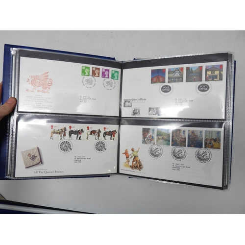 7116 - A large collection of first day covers three large folders, four half folders and another  dating fr... 