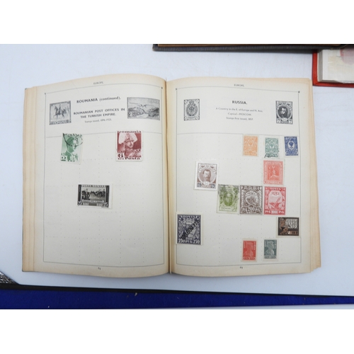 7130 - A worldwide stamp collection in four stock books together with an album of first day covers