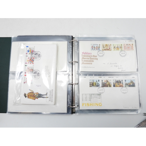 7130 - A worldwide stamp collection in four stock books together with an album of first day covers