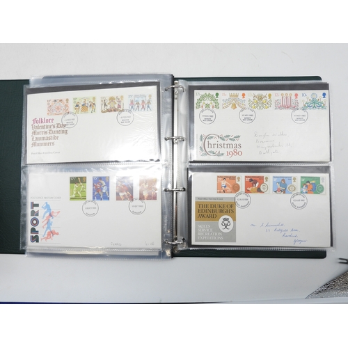 7130 - A worldwide stamp collection in four stock books together with an album of first day covers
