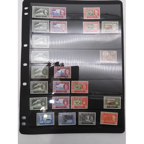 7083 - GB small collection of mint and used GB stamps on Hagner Pages plus 3 Presentation packs. Mixed cond... 