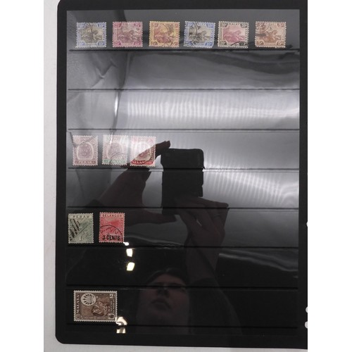 7083 - GB small collection of mint and used GB stamps on Hagner Pages plus 3 Presentation packs. Mixed cond... 