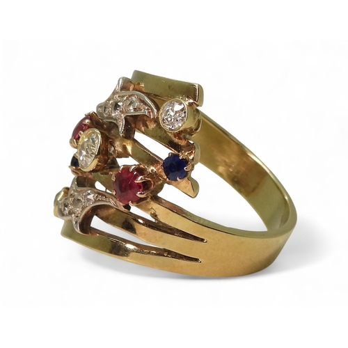 A unique dress ring, made in 9ct gold and studded with diamonds rubies ...