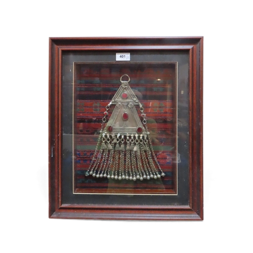 401 - A framed Saudi Arabian white metal breast piece, a lapis lazuli necklace and a Jambiya dagger&nbsp;