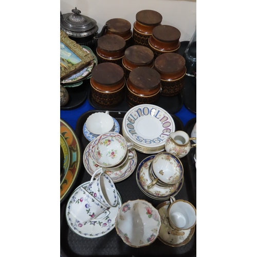 402 - A large Gouda plate decorated with chrysanthemums, Hornsea storage jars, assorted tea wares and plat... 