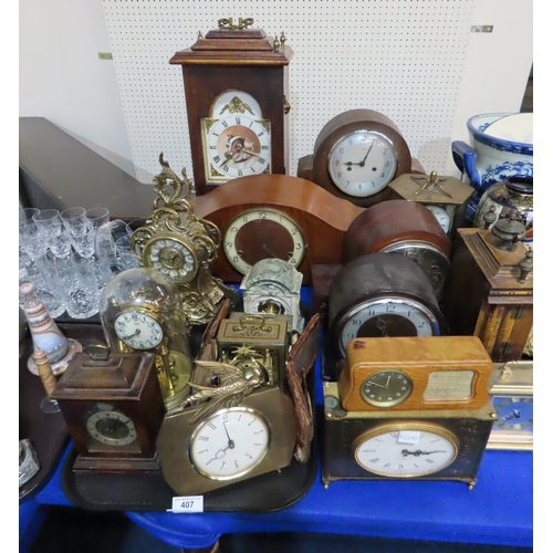 407 - A collection of clocks including Westclox, Junghans, London Clock Co etc
