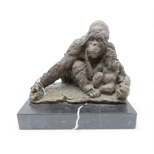 411 - A contemporary bronze of an Gorilla and infant on marble base, signed Walton