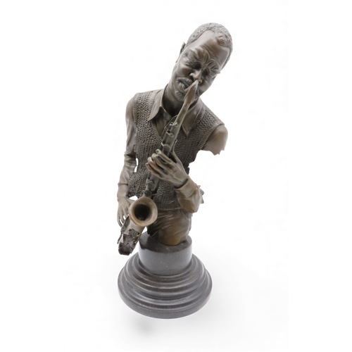 415 - A contemporary of the saxophonist Charlie Parker, signed Pino and on a marble base