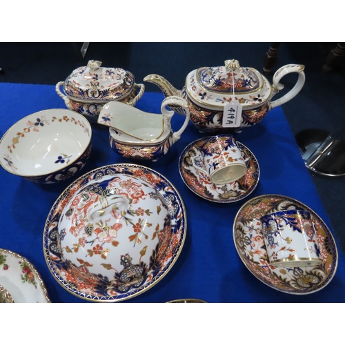 419A - A Derby imari pattern tea set comprising teapot, sucrier, jug, slop bowl, muffin dish and two cups a... 