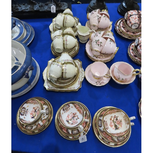 422 - Six Royal Crown Derby 383 imari pattern cups, saucers and plates together with a lady artist painted... 