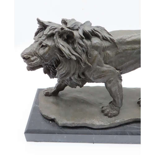 423A - A contemporary bronze of a male lion on marble base