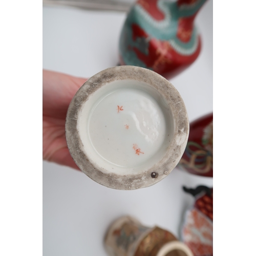 429 - A Japanese vase of lantern form decorated with figures, a dragon decorated cloisonne vase, a flower ... 