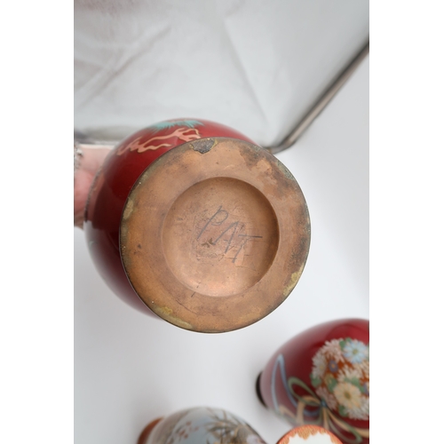 429 - A Japanese vase of lantern form decorated with figures, a dragon decorated cloisonne vase, a flower ... 