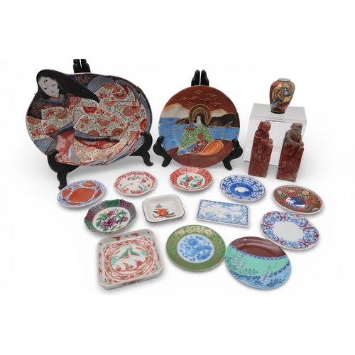 430 - A Japanese dish modelled as a woman in kimono, a pair of soapstone figures and assorted other dishes