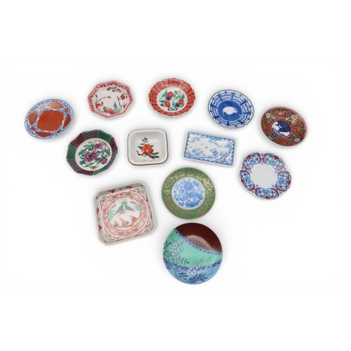 430 - A Japanese dish modelled as a woman in kimono, a pair of soapstone figures and assorted other dishes