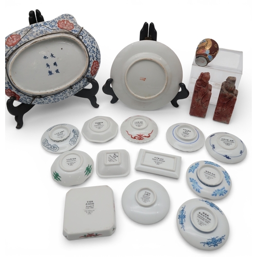 430 - A Japanese dish modelled as a woman in kimono, a pair of soapstone figures and assorted other dishes
