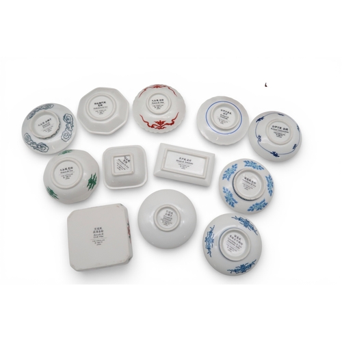 430 - A Japanese dish modelled as a woman in kimono, a pair of soapstone figures and assorted other dishes