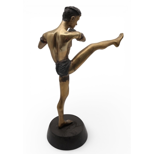 431 - A brass sculpture of a kick boxer