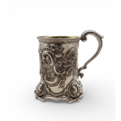 A Victorian silver christening mug, Henry Wilkinson & Co, Sheffield 1850, with repousse decoration, engraved  'A.J.B. SHAW 29TH APRIL 1886', 10cm high, 148gms