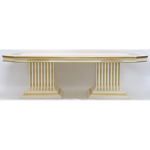 29 - A CONTEMPORARY VERSACE STYLE DINING ROOM SUITE&nbsp;consisting of gilt white dining table on twin fl... 