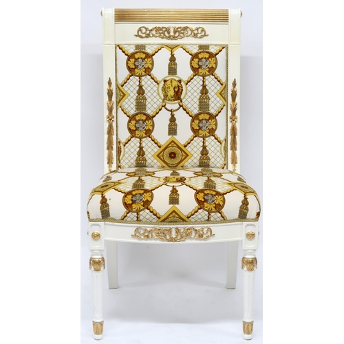 29 - A CONTEMPORARY VERSACE STYLE DINING ROOM SUITE&nbsp;consisting of gilt white dining table on twin fl... 