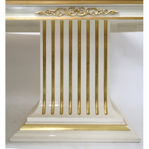29 - A CONTEMPORARY VERSACE STYLE DINING ROOM SUITE&nbsp;consisting of gilt white dining table on twin fl... 
