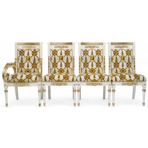 29 - A CONTEMPORARY VERSACE STYLE DINING ROOM SUITE&nbsp;consisting of gilt white dining table on twin fl... 