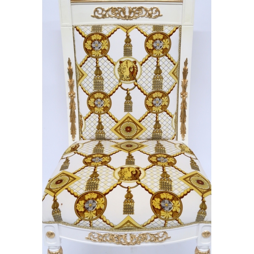 29 - A CONTEMPORARY VERSACE STYLE DINING ROOM SUITE&nbsp;consisting of gilt white dining table on twin fl... 