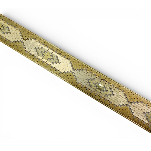2700 - A TRICOLOUR 9CT GOLD BRACELETwith fancy block pattern links, length 19.3cm, width 1.9cm, weight 40.9... 