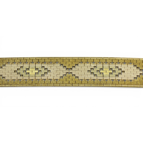 2700 - A TRICOLOUR 9CT GOLD BRACELETwith fancy block pattern links, length 19.3cm, width 1.9cm, weight 40.9... 