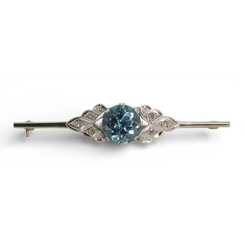 2701 - A BLUE ZIRCON & DIAMOND BROOCHthe mount in white metal with safety clasp, length 5cm, diameter o... 