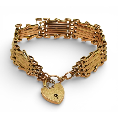2703 - A 9CT ROSE GOLD GATE BRACELETthe links are stamped 9c, and the clasp 9ct gold with the makers mark W... 