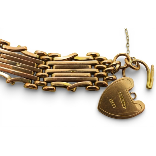2703 - A 9CT ROSE GOLD GATE BRACELETthe links are stamped 9c, and the clasp 9ct gold with the makers mark W... 
