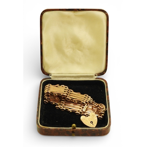 2703 - A 9CT ROSE GOLD GATE BRACELETthe links are stamped 9c, and the clasp 9ct gold with the makers mark W... 