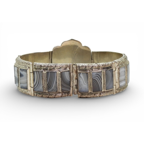 2704 - A VICTORIAN SCOTTISH AGATE BRACELETthe central flower set with a citrine, and good specimen banded g... 