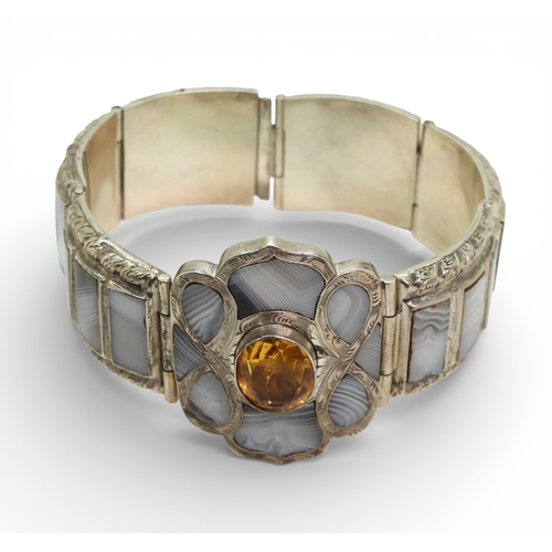 2704 - A VICTORIAN SCOTTISH AGATE BRACELETthe central flower set with a citrine, and good specimen banded g... 