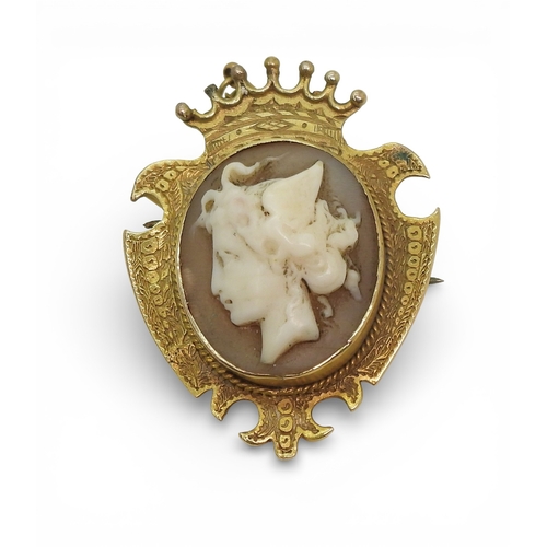 2706 - THREE VINTAGE BROOCHESa yellow metal bar brooch set with a blue glass gem, faintly stamped with a ha... 