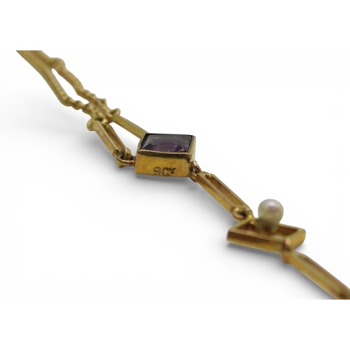 2709 - A VINTAGE NECKLACEmade in 9ct gold and set with amethyst and seed pearls. Length of the pendant drop... 