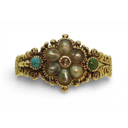 2716 - A GEORGIAN STYLE RINGmounted in yellow metal the shoulders with shell and flower details, set with a... 